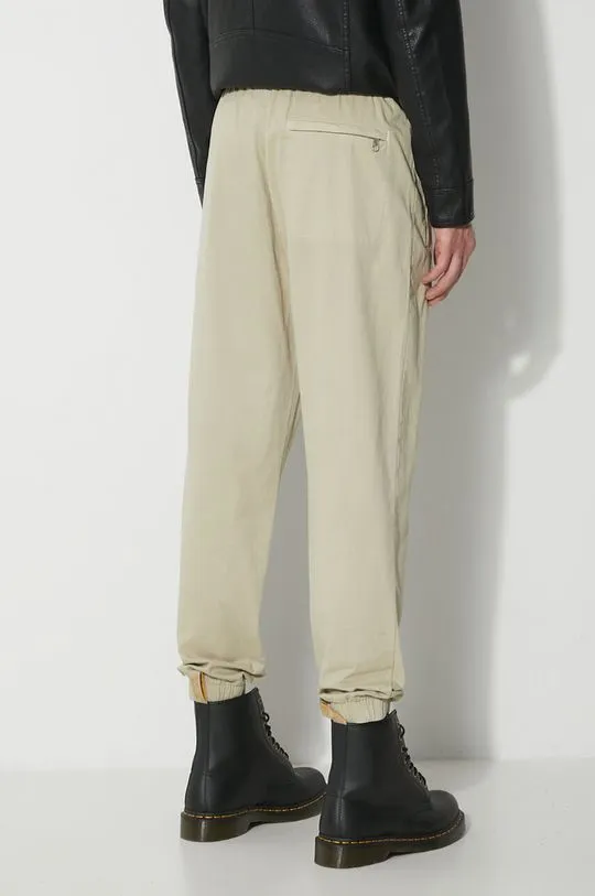 adidas Originals cotton trousers green color IS1722