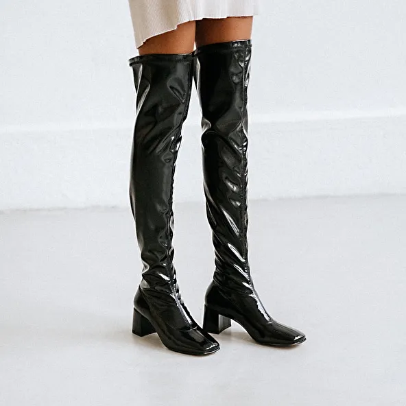 High boots with heels in black stretch patent