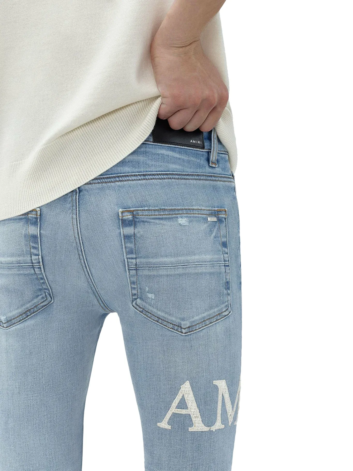 JEANS MX1 CON LOGO BOUCLE