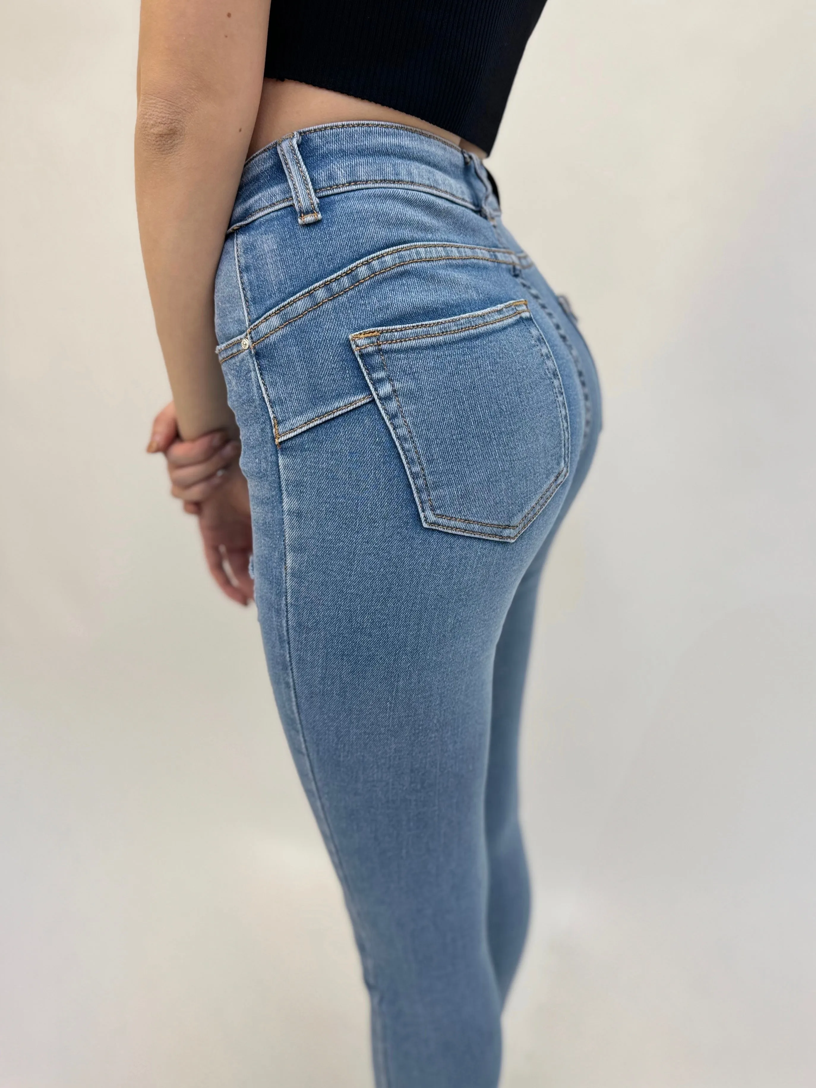 Pantaloni jeans skinny vita media effetto push up